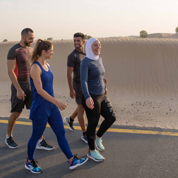 Fitness First members walking in the desert
