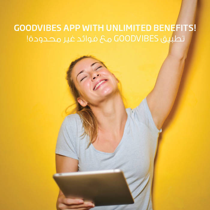 happy woman using Fitness first Good Vibes application happy woman using Fitness first Good Vibes application