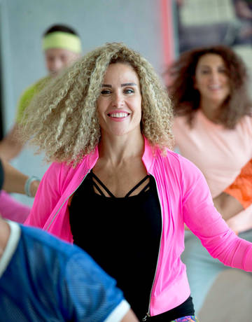 women in a group dance class