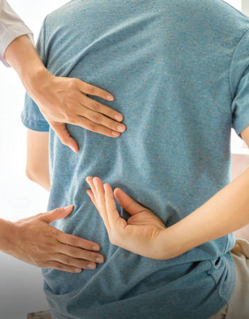 checking on a patient's back pain checking on a patient's back pain